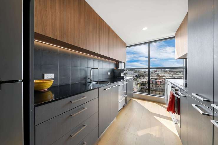 Angus Muir and his partner, Liz Allen, fell in love with their Auckland pad, at 504/1 Cobden Street, on the spot. Photo / Supplied