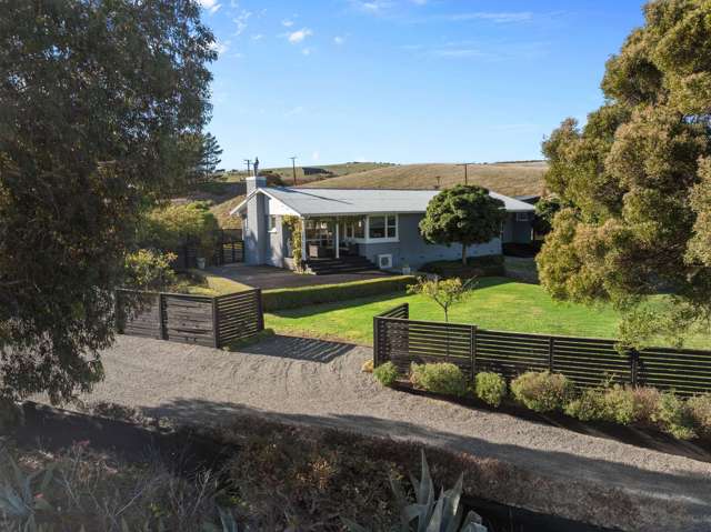 Serene Coastal Living with Vineyard Views!