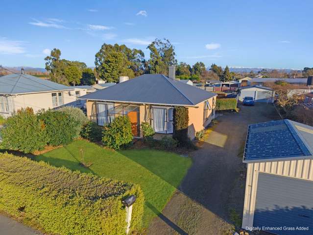 3 Car Garaging & Great Outdoor Living!
