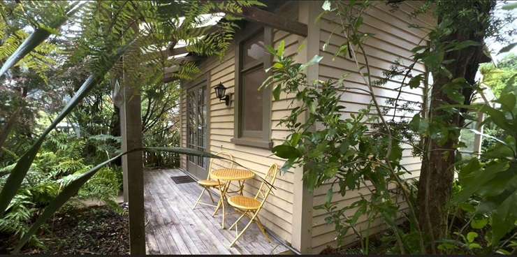 The former Taylorville School, in Greymouth, has been transformed into a massive eight-bedroom, four-bathroom home with two kitchens. Photo / Supplied
