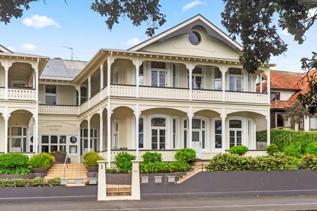 American couple selling waterfront apartment in historic Devonport building