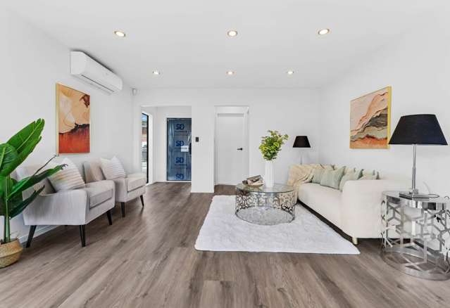 Modern Family Living on a Prime Corner Section