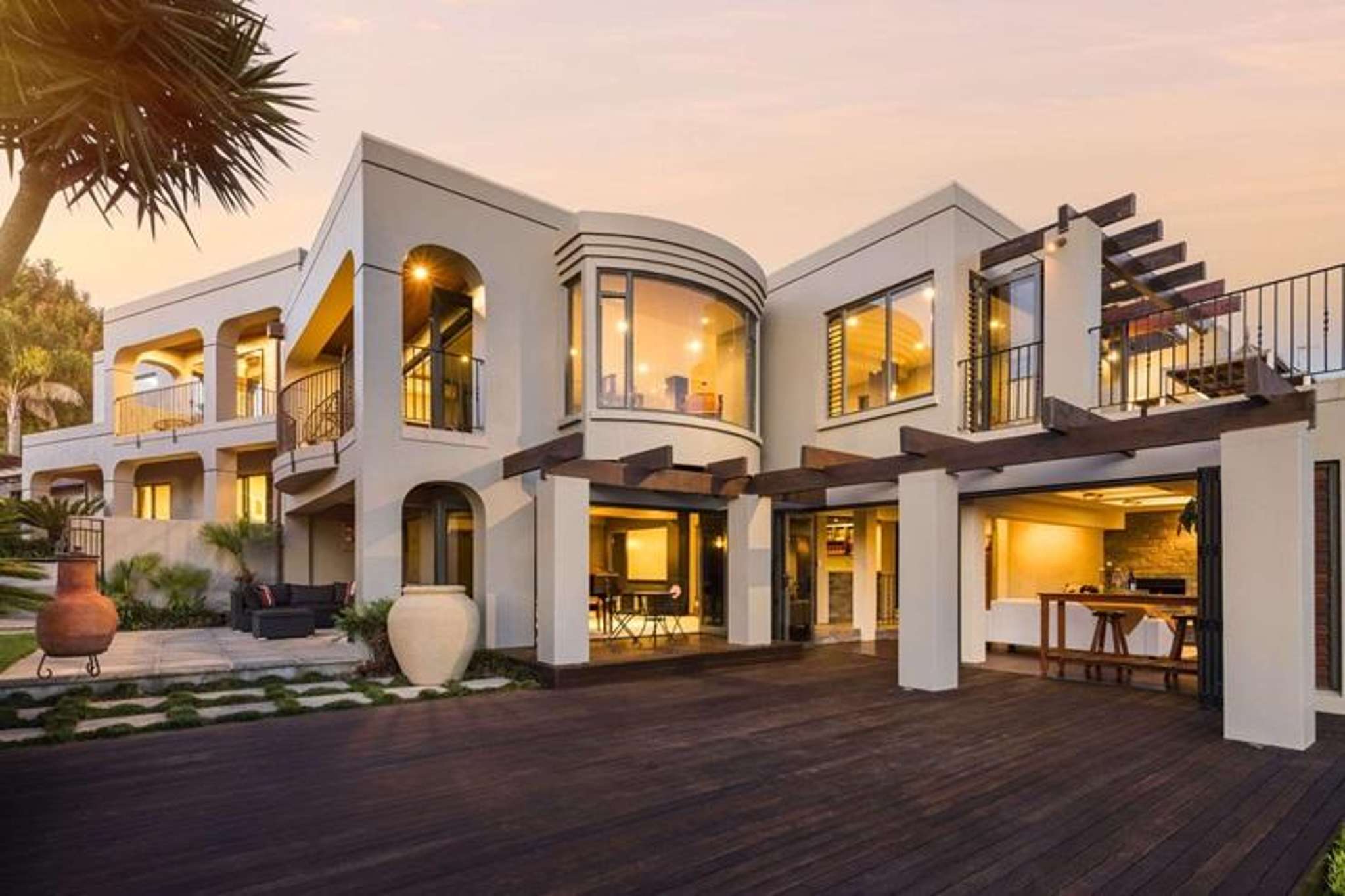Neighbour splashes the cash: Trophy home obliterates its RV