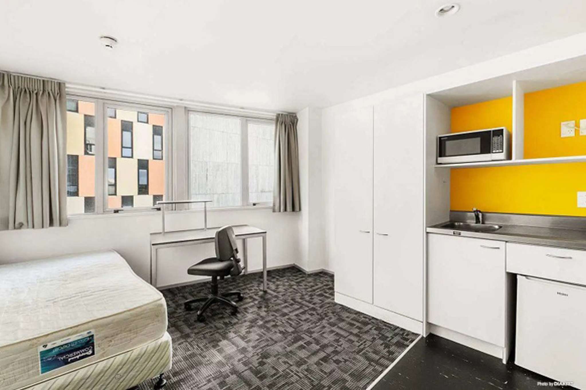 'Just like a charity auction': Tiny Auckland apartment sells for $42,000