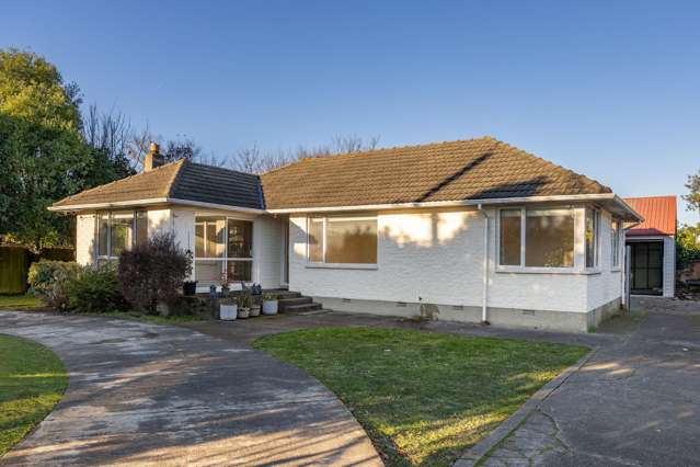 "TWO OPEN PLAN HOMES IN ONE"