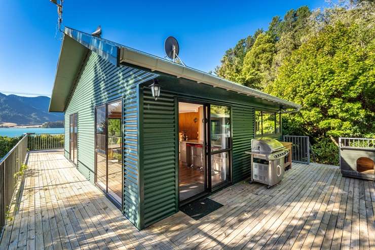 The historic villa for sale at 1024/1028 Elie Bay Road, in Marlborough Sounds. Photo / Supplied