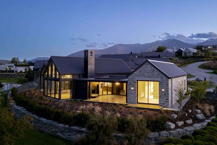 2 Millvista Lane is one of the 11 homes currently for sale in Millbrook Resort. It has an RV of over <img9m and is described by the listing agents as the epitome of luxury and sophistication. Photo / Supplied