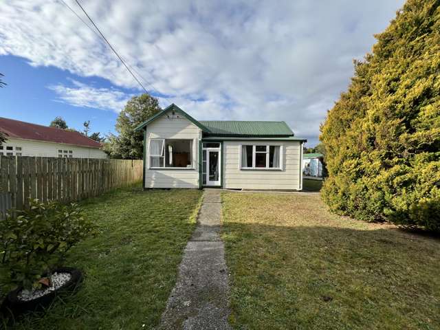 Home with Sheds Space and A Great Location.