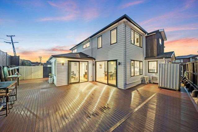 $1 reserve twist: South Auckland family beats 26 bidders to home they saw just minutes before