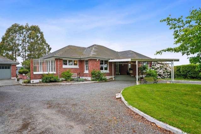 Your Dream Home in Kirwee with Expansive Garaging!