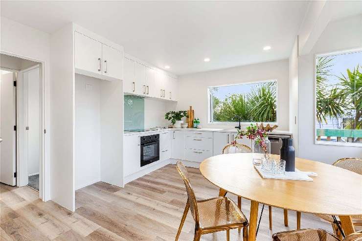 How the three-bedroom house at Aeroview Drive, in Beach Haven, Auckland, looked when it was picked up by trader Mark Trafford in April. Photo / Supplied