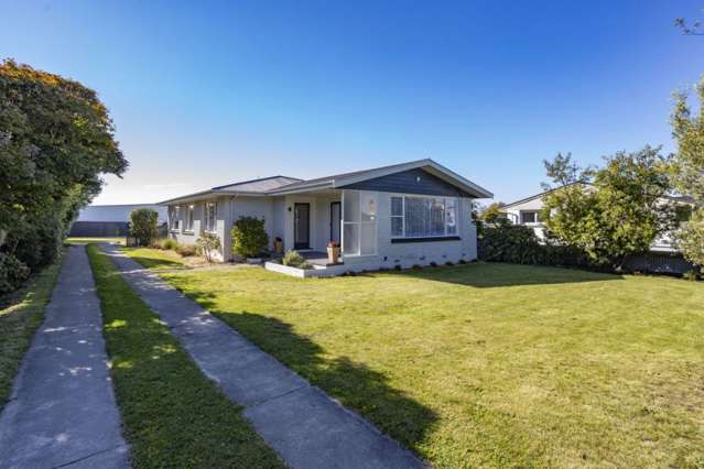 Four Bedrooms, Fresh Updates & Fantastic Garaging