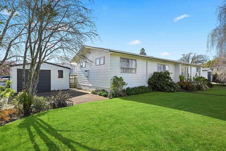 An older three-bedroom weatherboard home on Rosebank Road, in Papatoetoe, with a separate smaller two-bedroom dwelling was hotly contested when it went to auction this week and sold over RV for <img.432m. Photo / Supplied