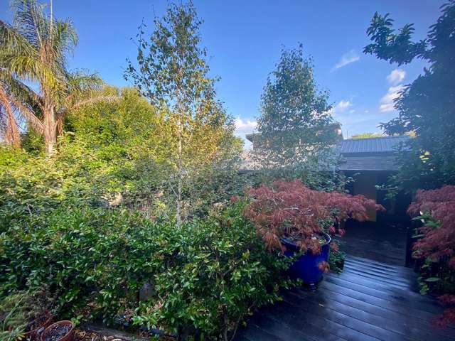 Charming 2BR Home with Lush Garden