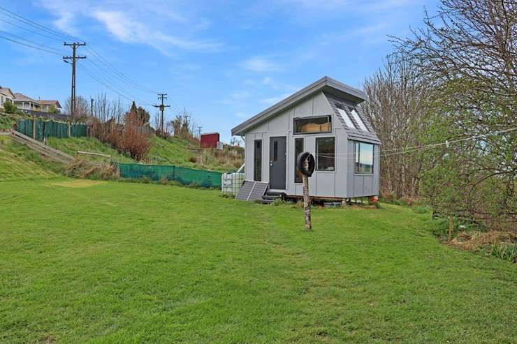 A two-bedroom home for sale at 11 High Street East, in Nightcaps, Southland, is seeking offers over <img59,000. Photo / Supplied