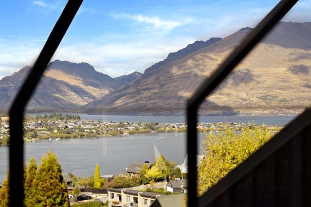 Lake views, two garages – rare townhouse find