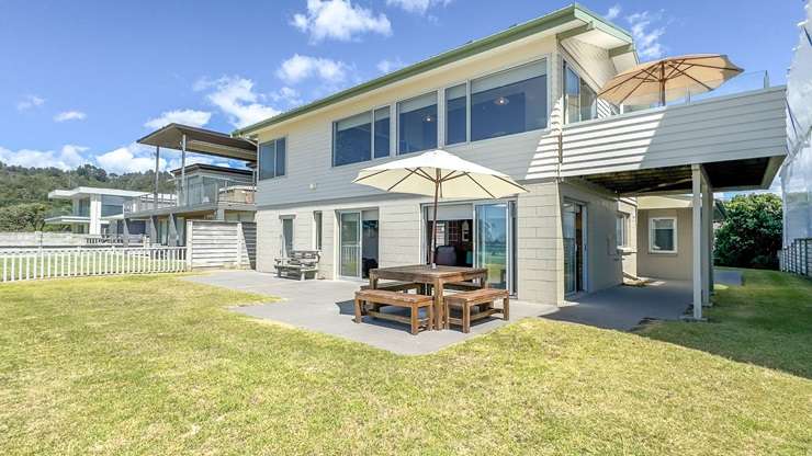 A concrete and glass beach home at Beverley Terrace, in Whangamatā, sold in December. It had a RV of $6.45m. Photo / Supplied