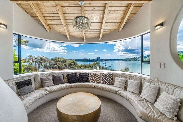 The distinctive waterfront house was designed by renowned Kiwi architect Ian Burrow and sold for just under $2m. Photo / Supplied