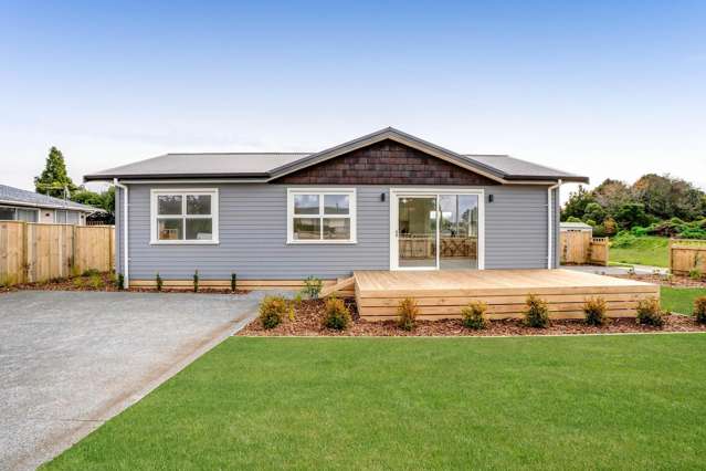 STYLISH, BRAND NEW HOME IN PRIME CORNER LOCATION