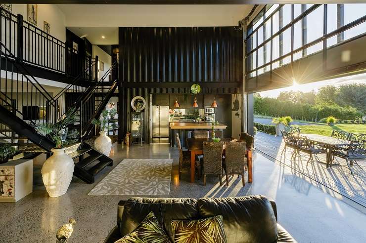 The five-bedroom, three-bathroom home on Ranby Road, in Ohaupo, was built using 12 steel shipping containers. Photo / Supplied