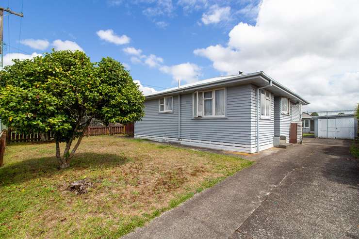 brick house with car parked in front  2 and 3/25 Simkin Avenue, St Johns, Auckland