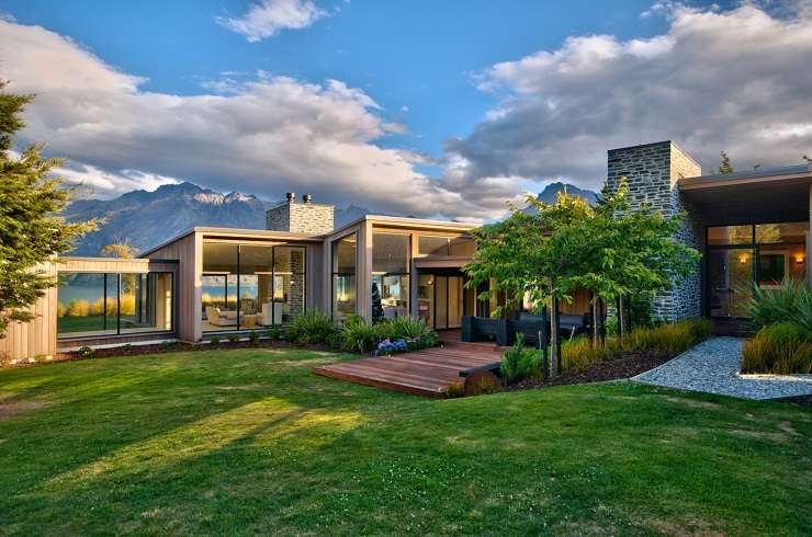 glass and stone luxury lodge above Lake Wakatipu Queenstown