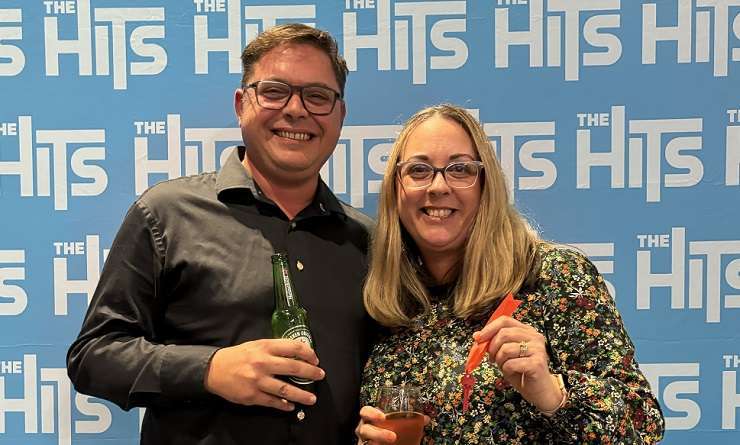 The Hits Drive time host Matty McLean congratulates Christchurch homeowner Shona Robertson on her win. Photo / Supplied