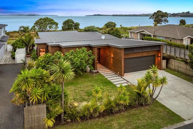 Modern Cedar Gem with Beachfront Tranquility