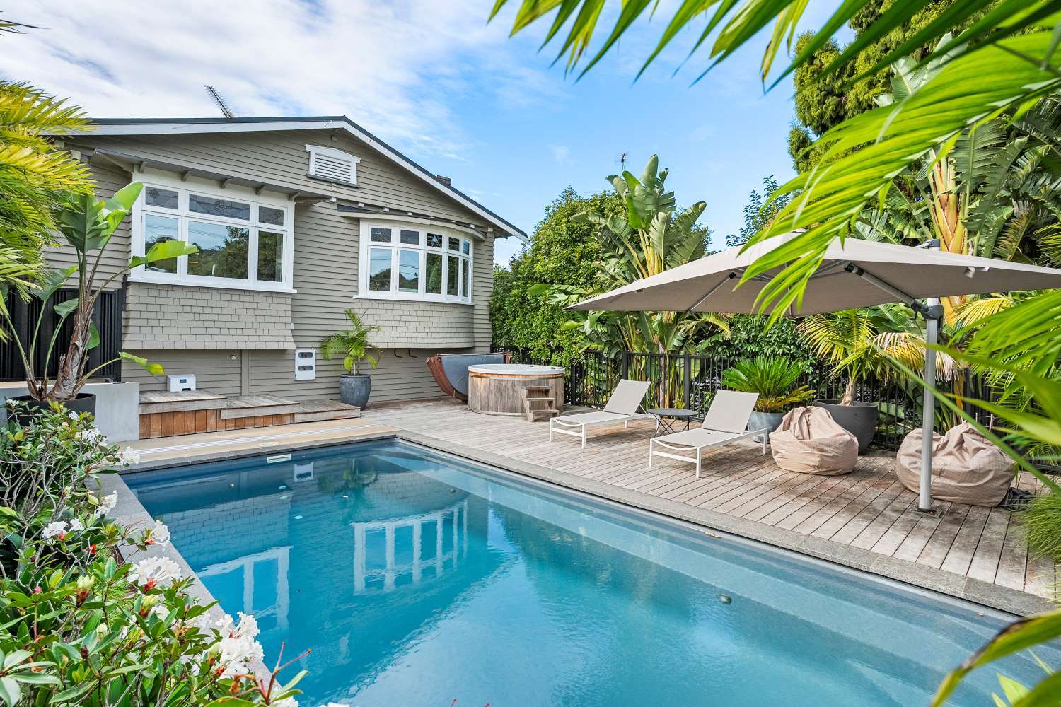 Mt Albert family home with pool and resort-style garden up for grabs ...