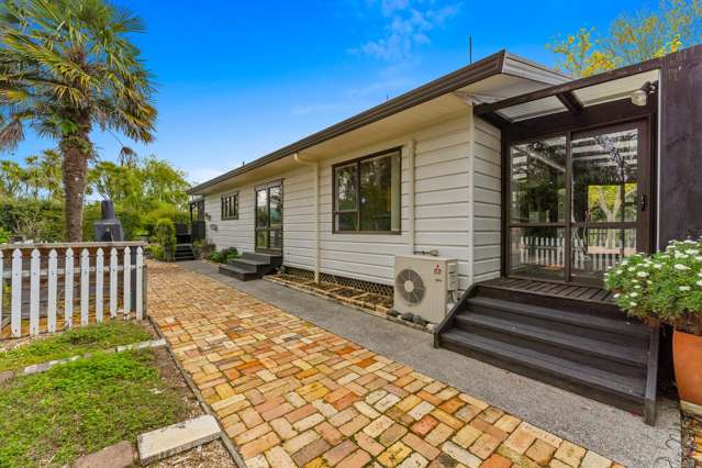 Country Charm Meets Modern Living on Acreage!