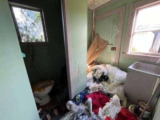 First-home buyer pays $235,000 for villa overflowing with junk