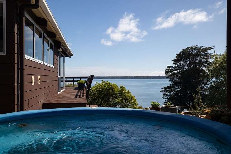 A 1960s home on a 7816sqm waterfront section in Matua is for sale for the first time in 57 years. Photo / Supplied