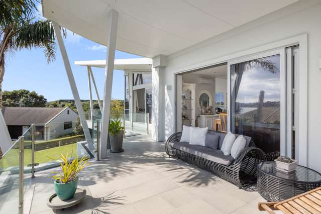 Car Enthusiasts Dream with Water Views