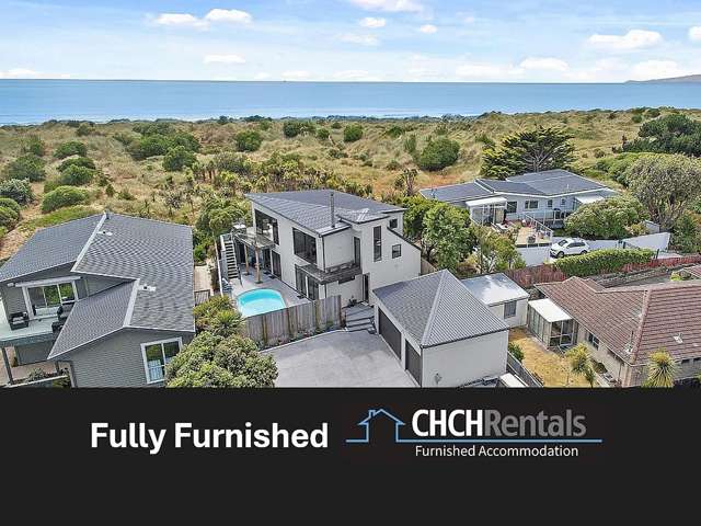 Beachfront Access Stylish Fully Furnished Apartment!