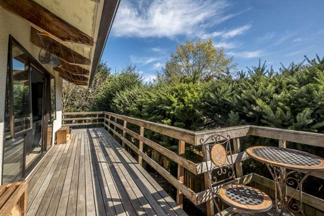 Elevated views and exceptional garaging!