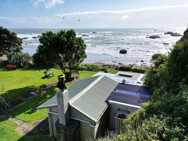 The three-bedroom home on State Highway 6, in Coal Creek, Greymouth, proved popular with buyers. Photo / Supplied