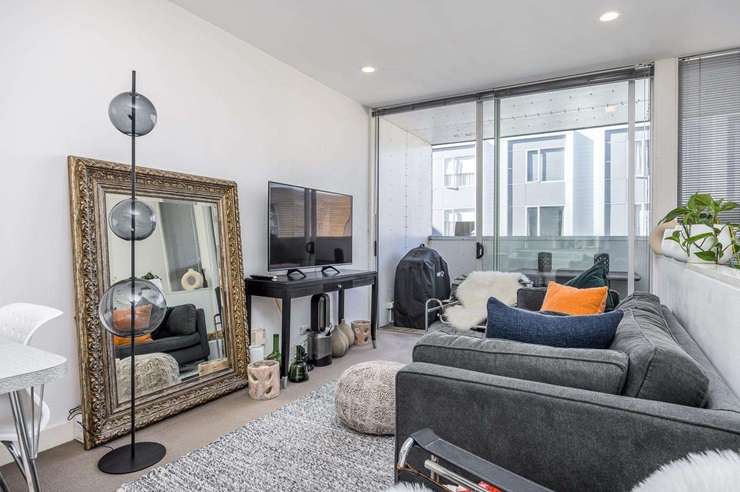 A two-bedroom, two-bathroom penthouse in the Mirage, in Auckland's Parnell, is being sold at auction with a <img reserve. Photo / Supplied