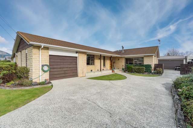 Sun-soaked family living with generous garaging