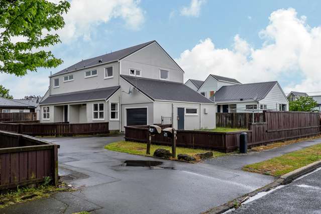 Four townhouses on one corner site!