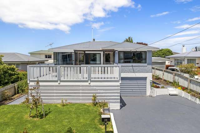 Elevated Family Home with Conservatory & Deck