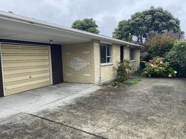 Partially Renovated unit with garage