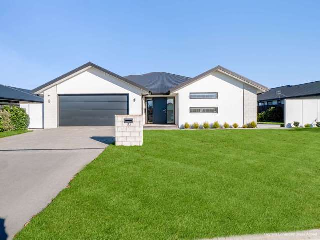 Sun-Soaked Sanctuary with 3-Car Garaging