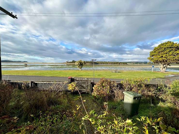 The two-bedroom cottage on Park Lane, in Pounawea, Otago, sits across from the estuary. Photo / Supplied