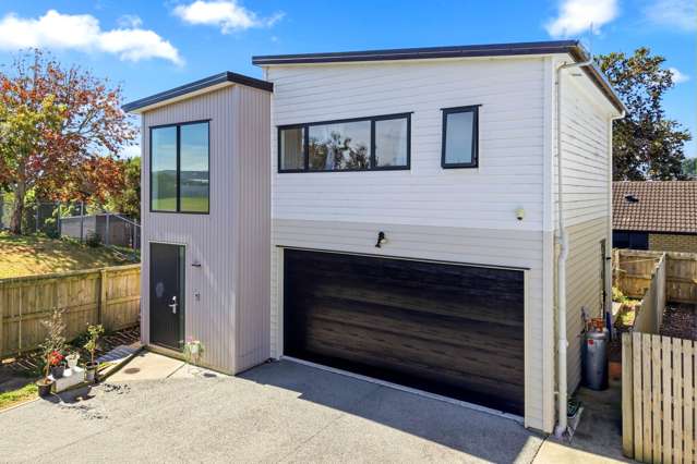 Modern Corner Living with Double Garage!