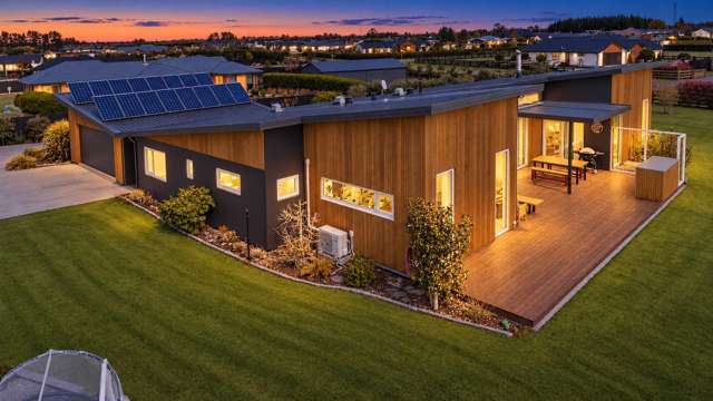 Two Homes + Five Car Garaging = Endless Potential