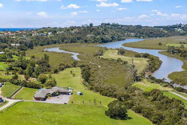 Rare Multi-Generational Riverside Retreat