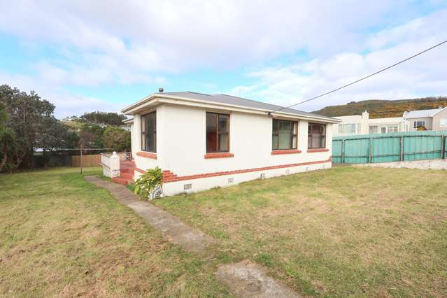 Coastal Opportunity With Space And Potential!