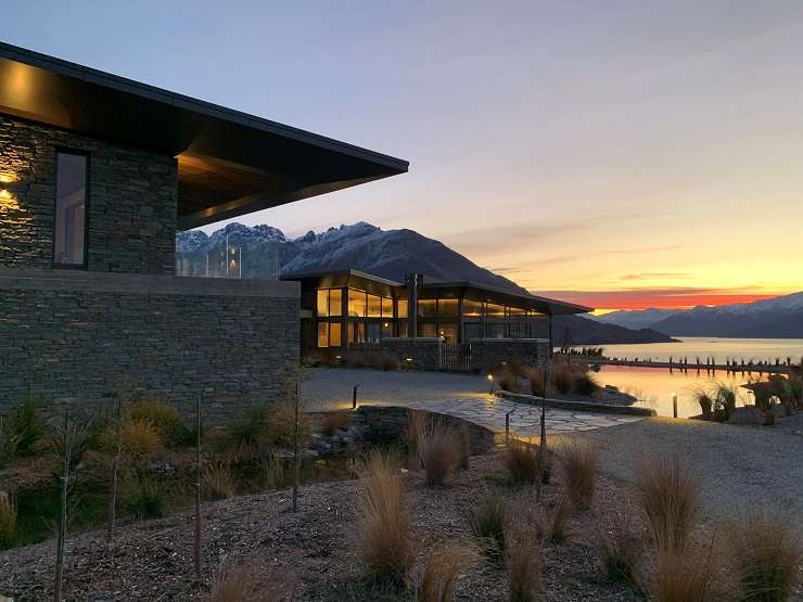 glass and stone luxury lodge above Lake Wakatipu Queenstown