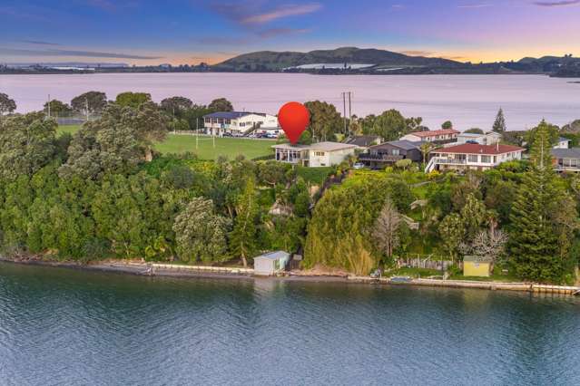 Waterfront Wonder with Limitless Potential!