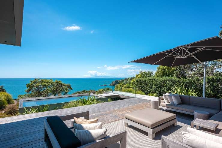 modern steel glass and cedar house with swimming pool in foreground  24 Newton Road, Oneroa, Waiheke Island, Auckland